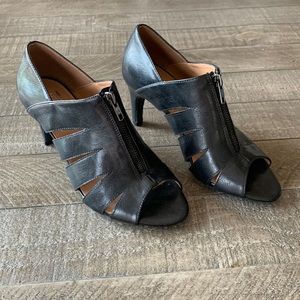 Black peep toe faux leather heels